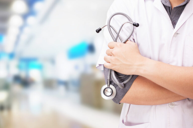 doctor-with-a-stethoscope-in-the-hands-and-hospital-background (2)